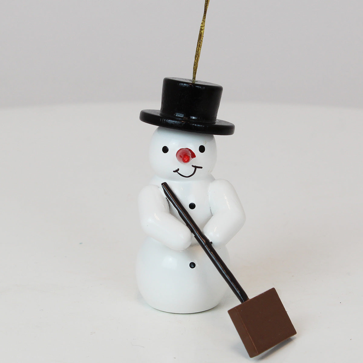 Christbaumschmuck Schneemann mit Schneeschieber