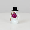 Schneemann mit lila Lampion