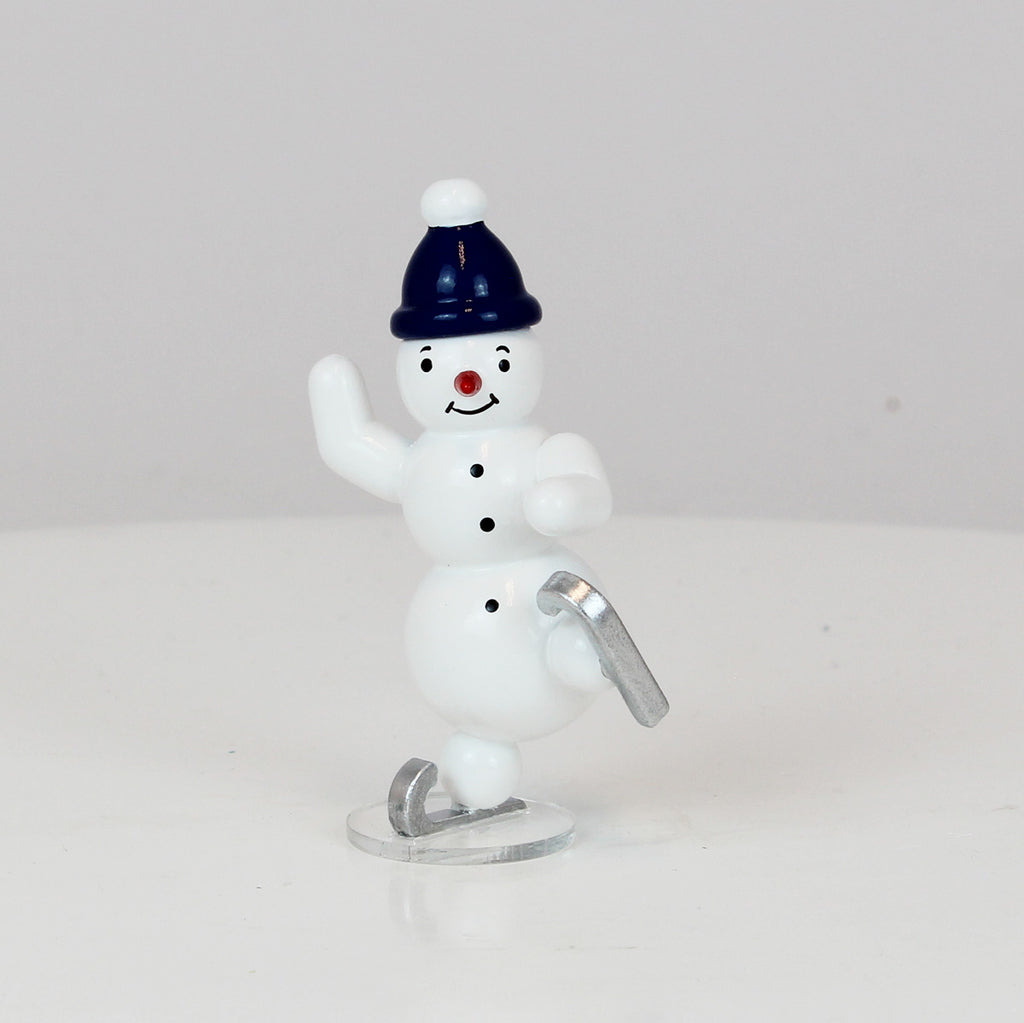 Schneemann Schlittschuhläufer