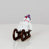 Schneemann auf Schlitten