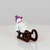 Schneemann auf Schlitten