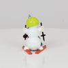 Schneemann mit Ski und Baum
